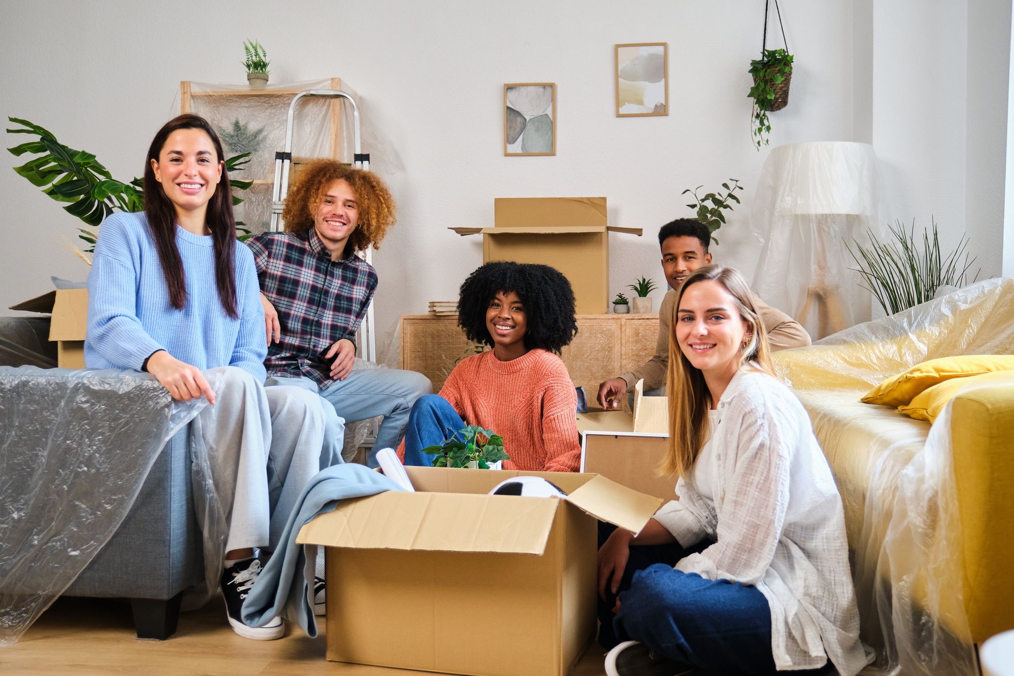 Group of students moving in a student residence at the university.